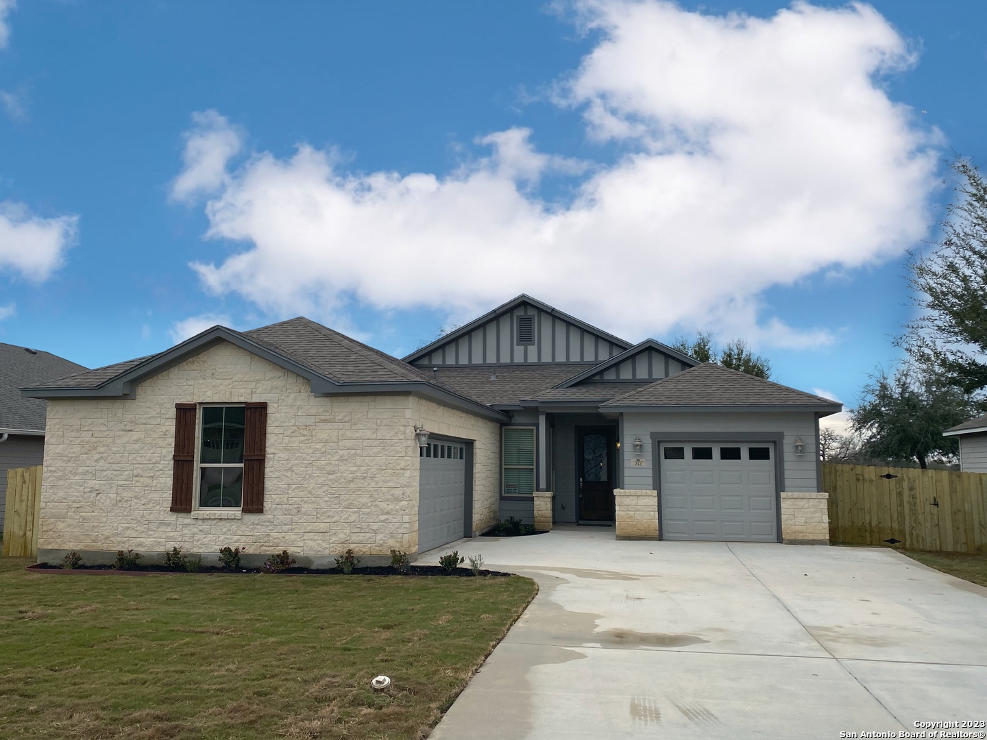 a view of a house with a garden