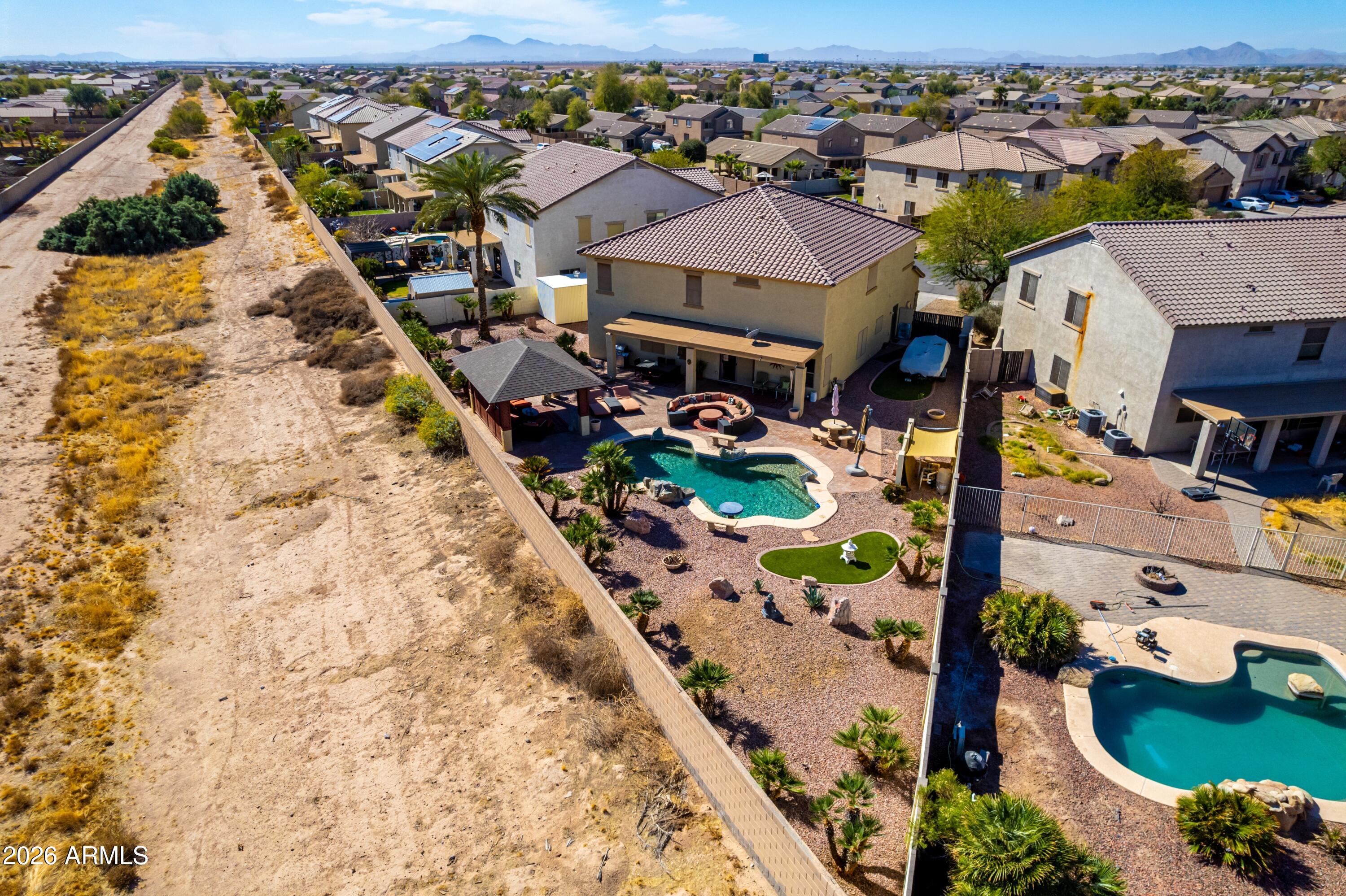 19221 North Toya Street Maricopa, AZ 85138 - Photo 3 of 22 an aerial view of a house with a yard