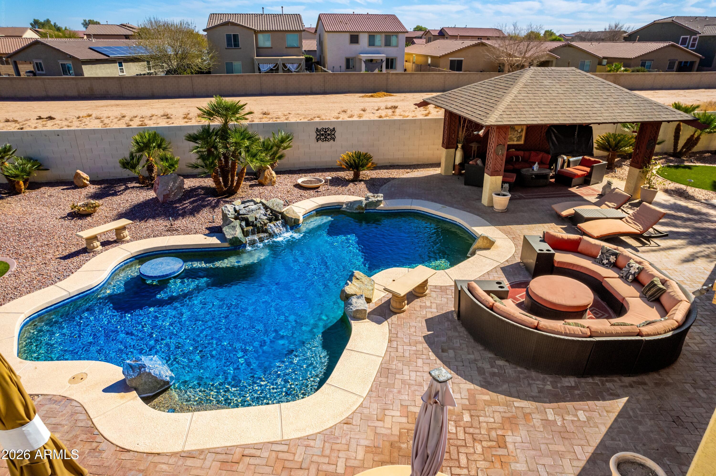 19221 North Toya Street Maricopa, AZ 85138 - Photo 5 of 22 a view of a chairs and table in the patio
