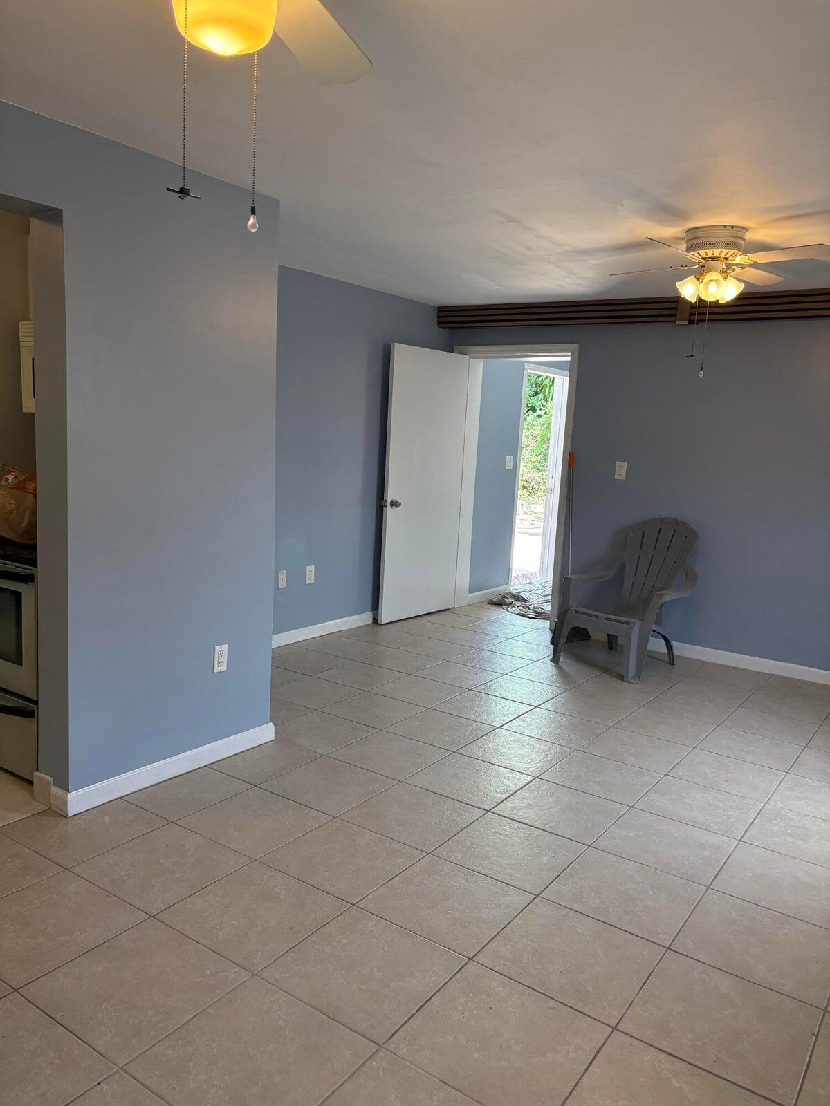 626 Minnesota Street Lantana, FL 33462 - Photo 5 of 15 a view of an empty room with a window