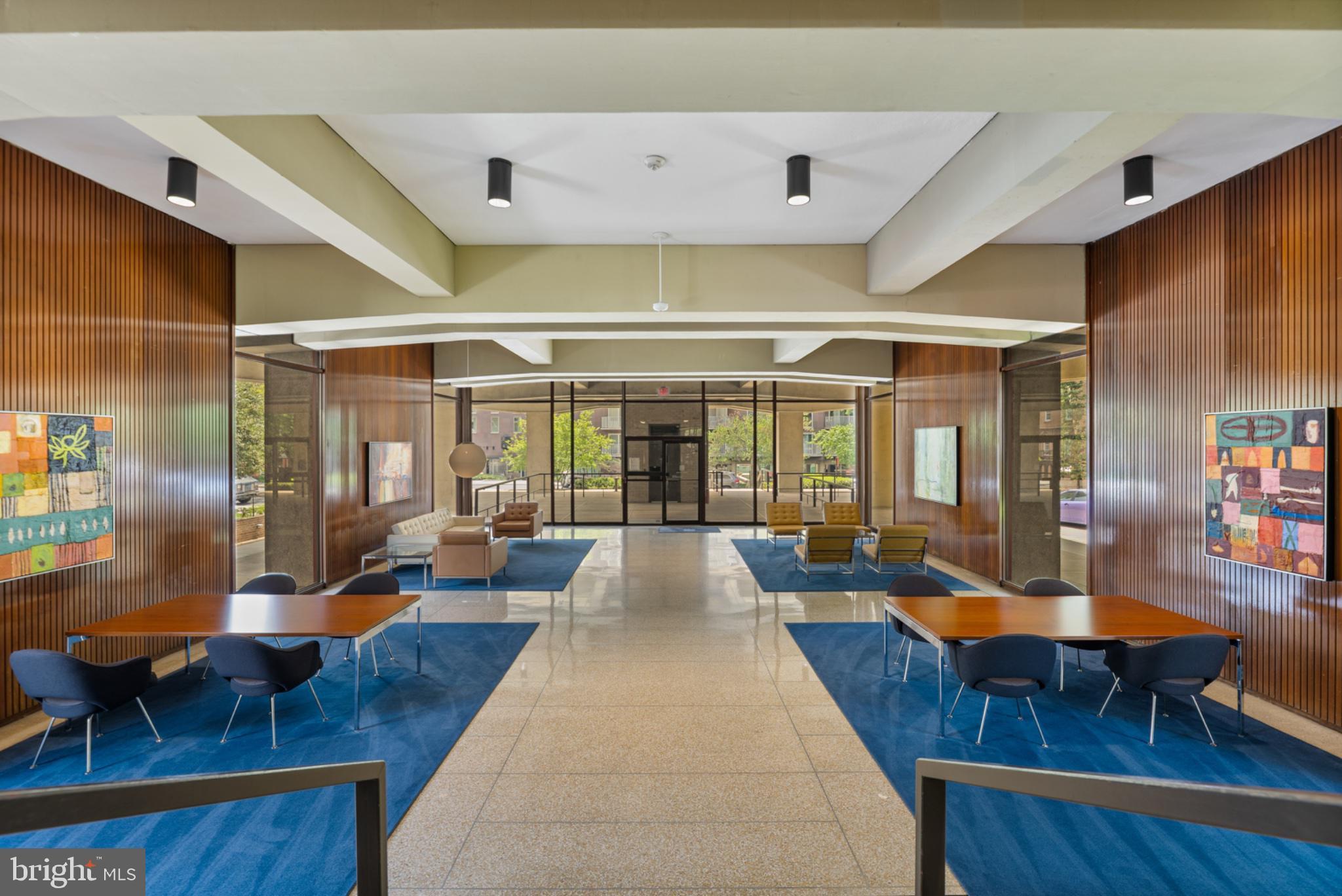 490 M Street Southwest, Unit W101 Washington, DC 20024 - Photo 1 of 25 Modern lobby with vibrant art.