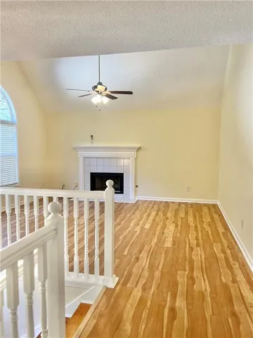 a view of wooden floor with a fireplace