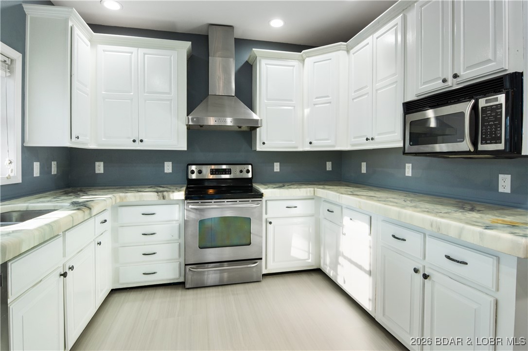 22 Navajo Road Four Seasons, MO 65049 - Photo 7 of 42 Huge counter space in this kitchen!!