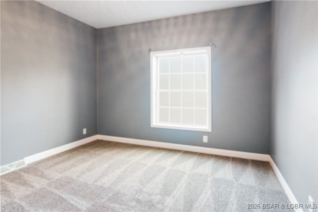 22 Navajo Road Four Seasons, MO 65049 - Photo 10 of 42 Upstairs guest bedroom.