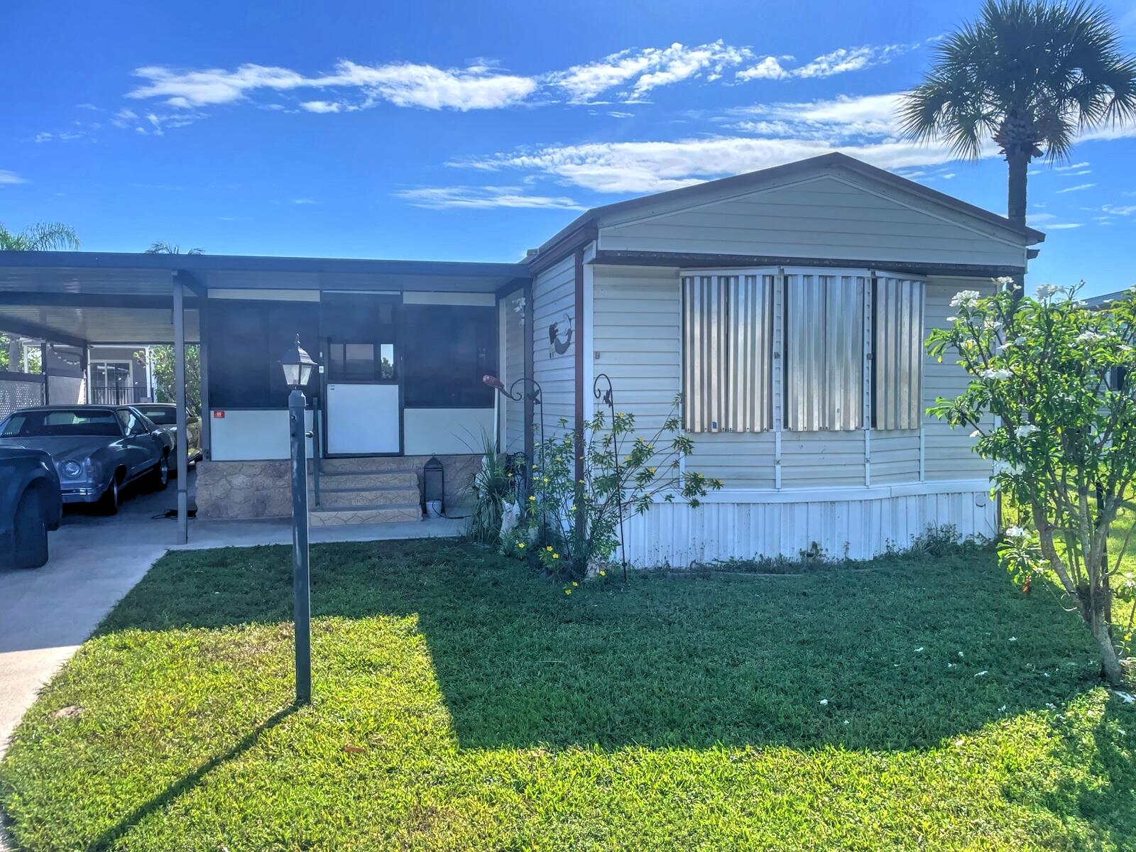 7319 43rd Way North Riviera Beach, FL 33404 - Photo 1 of 7 Front