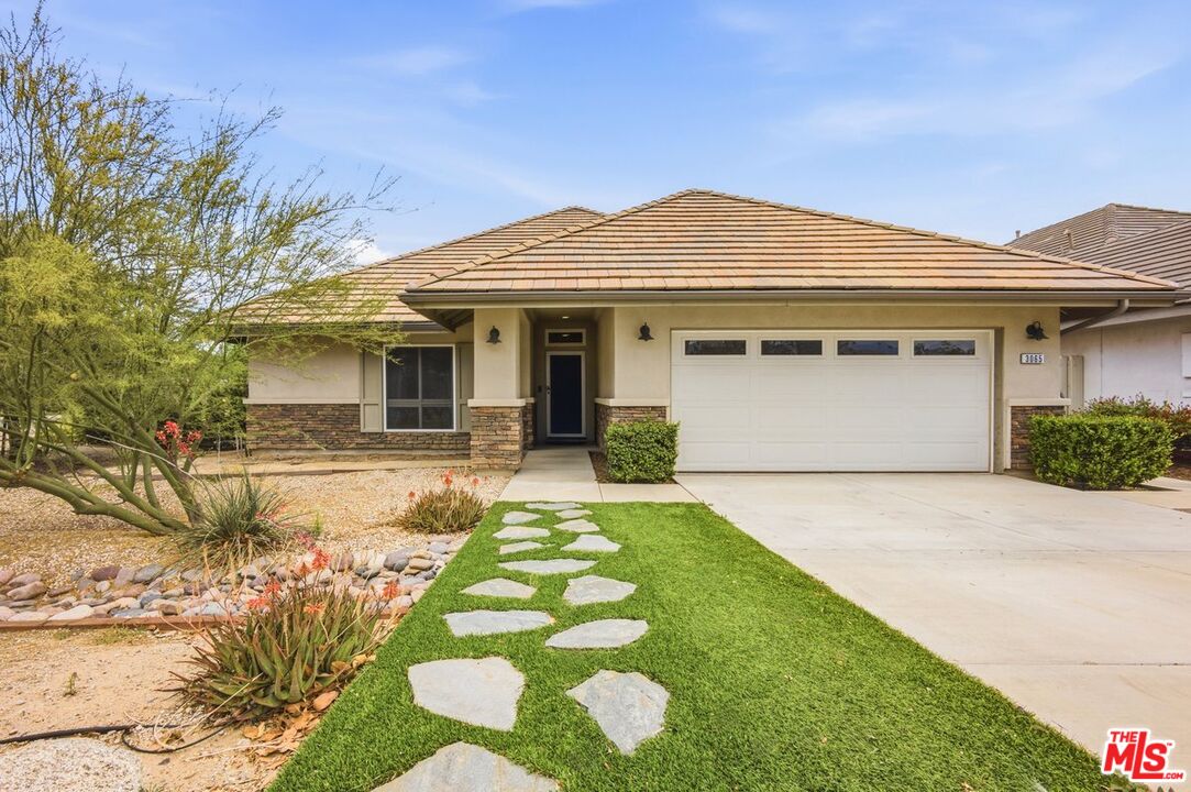 3065 Gibson Street Riverside, CA 92503 - Photo 1 of 15 a front view of a house with a yard