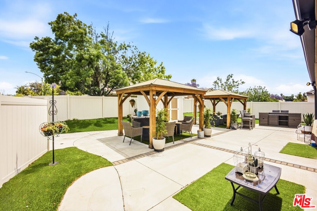 3065 Gibson Street Riverside, CA 92503 - Photo 3 of 15 a view of outdoor space yard deck patio and fire pit