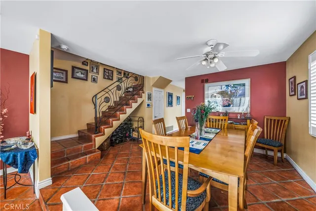 a bathroom with a bathtub shower sink and mirror