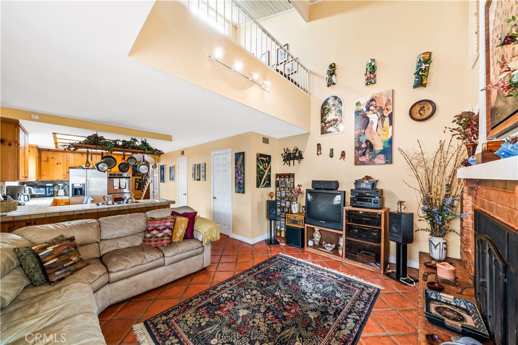 427 21st Street Huntington Beach, CA 92648 - Photo 16 of 63 a living room with furniture and a rug