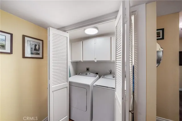 a view of balcony with furniture