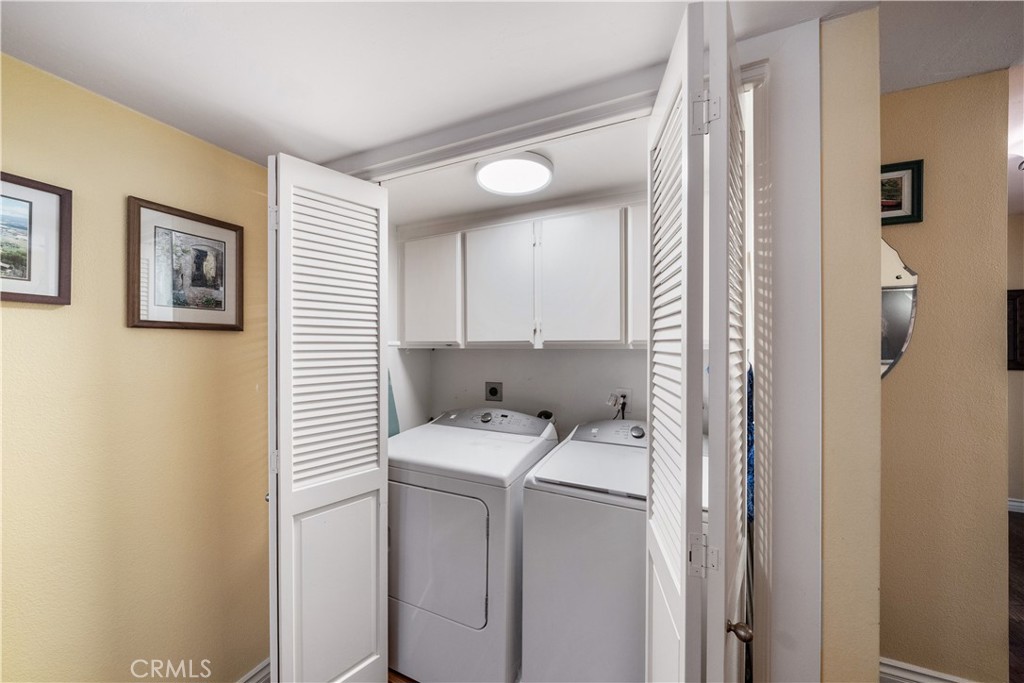 427 21st Street Huntington Beach, CA 92648 - Photo 24 of 63 a view of bathroom with a washer and dryer