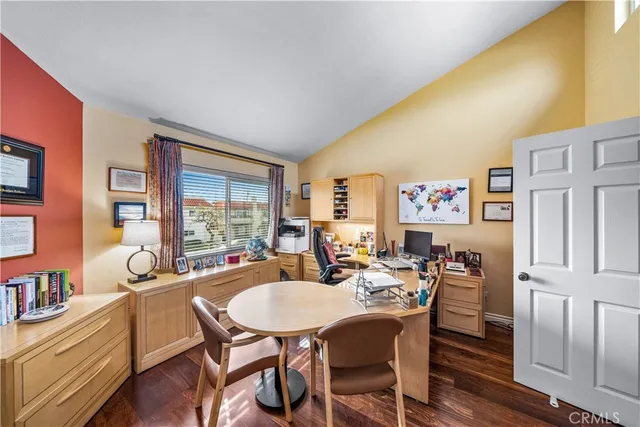 a view of a house with backyard and swimming pool