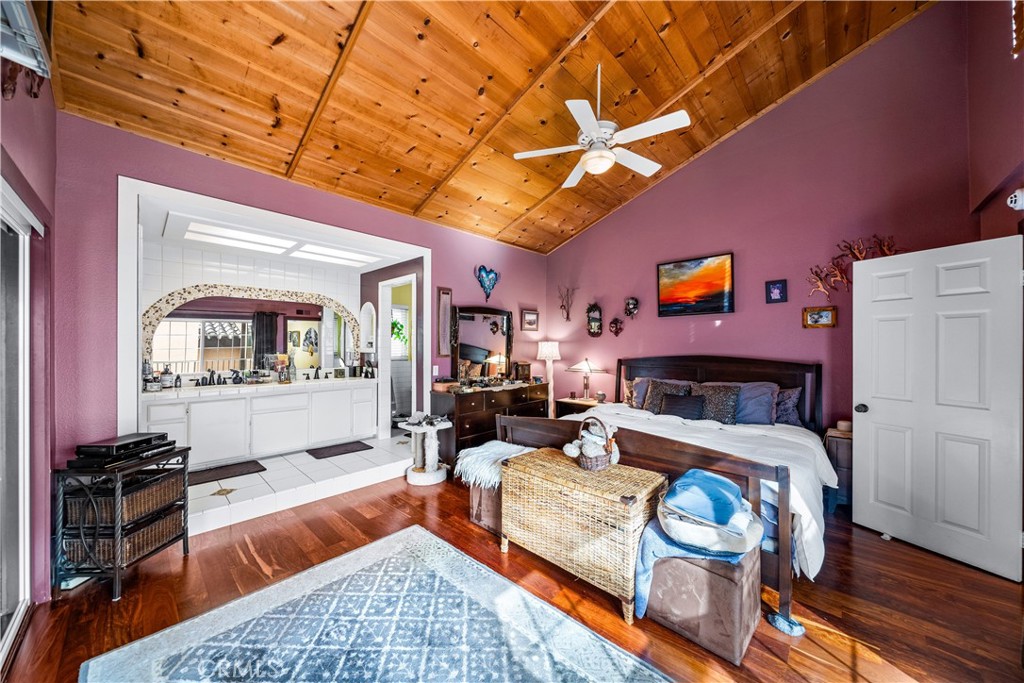 427 21st Street Huntington Beach, CA 92648 - Photo 33 of 63 a bed room with a bed and a couch