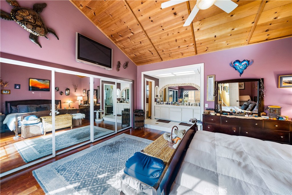 427 21st Street Huntington Beach, CA 92648 - Photo 34 of 63 a living room with furniture and a flat screen tv