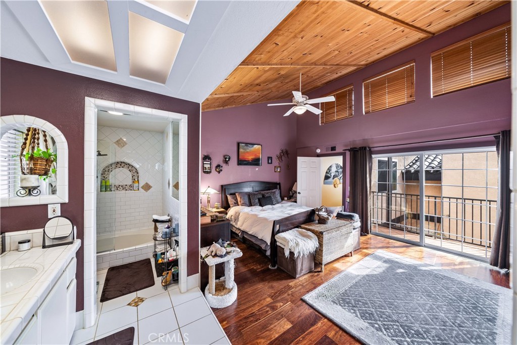 427 21st Street Huntington Beach, CA 92648 - Photo 37 of 63 a bedroom with furniture and a window