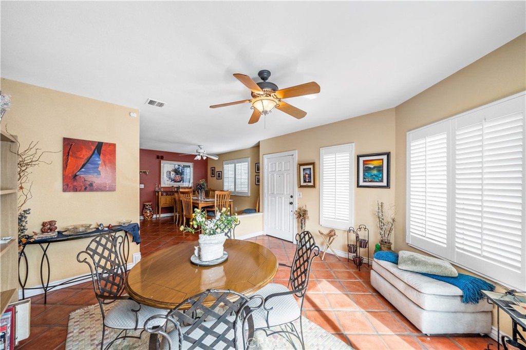 427 21st Street Huntington Beach, CA 92648 - Photo 10 of 63 a living room with furniture kitchen view and a window