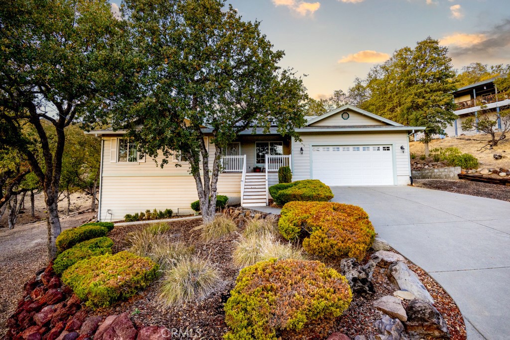 19008 Redbud Road Hidden Valley Lake, CA 95467 - Photo 1 of 1 a front view of a house with a yard