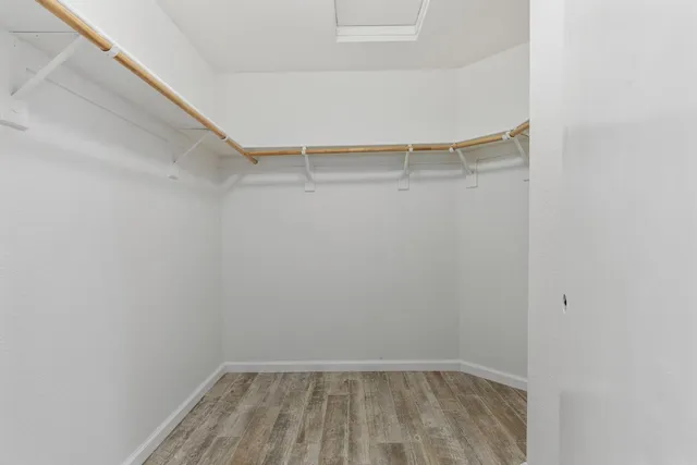 a view of a room with racks on the wall