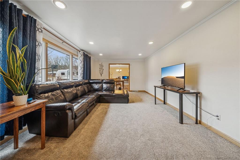 121 Mulberry Street Hopwood, PA 15445 - Photo 12 of 50 a living room with furniture and a painting on the wall