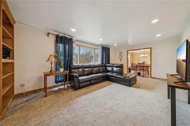 a kitchen with stainless steel appliances granite countertop a stove and a sink