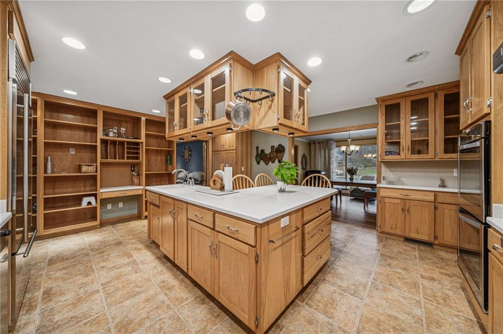 121 Mulberry Street Hopwood, PA 15445 - Photo 14 of 50 a kitchen with stainless steel appliances granite countertop a stove and a sink
