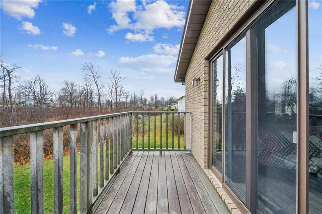 121 Mulberry Street Hopwood, PA 15445 - Photo 21 of 50 a view of balcony with wooden floor and fence