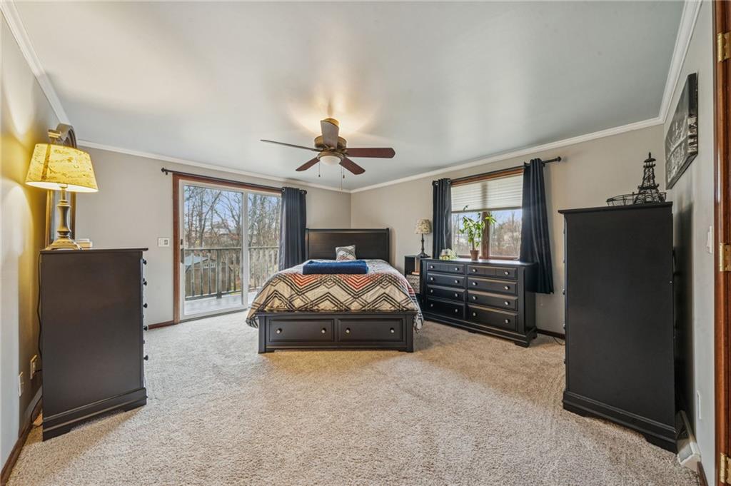 121 Mulberry Street Hopwood, PA 15445 - Photo 22 of 50 a bedroom with a bed and a window