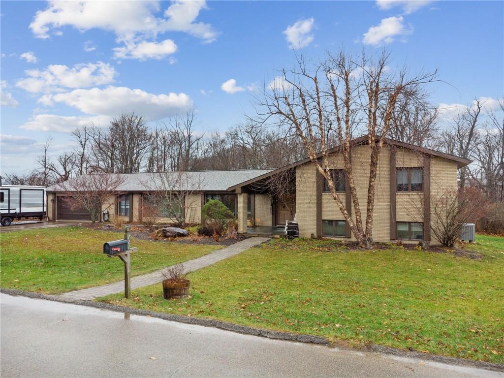 121 Mulberry Street Hopwood, PA 15445 - Photo 46 of 50 a view of a house with a yard
