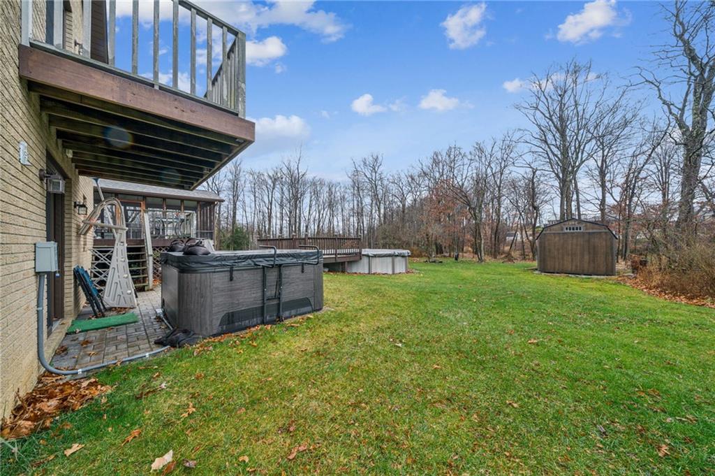 121 Mulberry Street Hopwood, PA 15445 - Photo 47 of 50 a view of a backyard with table and chairs