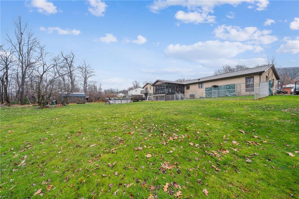 121 Mulberry Street Hopwood, PA 15445 - Photo 50 of 50 a view of a house with a yard