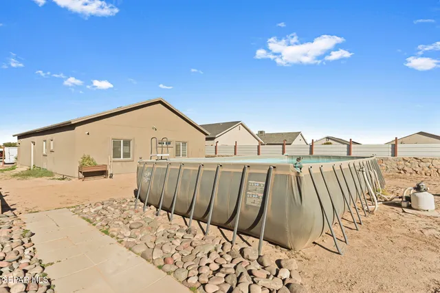 a view of a house with a roof deck