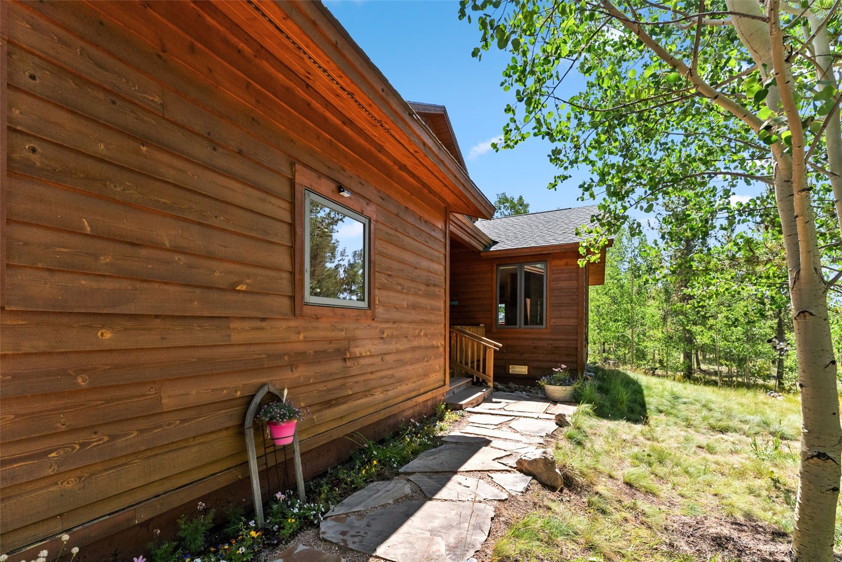 228 Glacier Ridge Road Alma, CO 80420 - Photo 47 of 50 a front view of a house with a yard