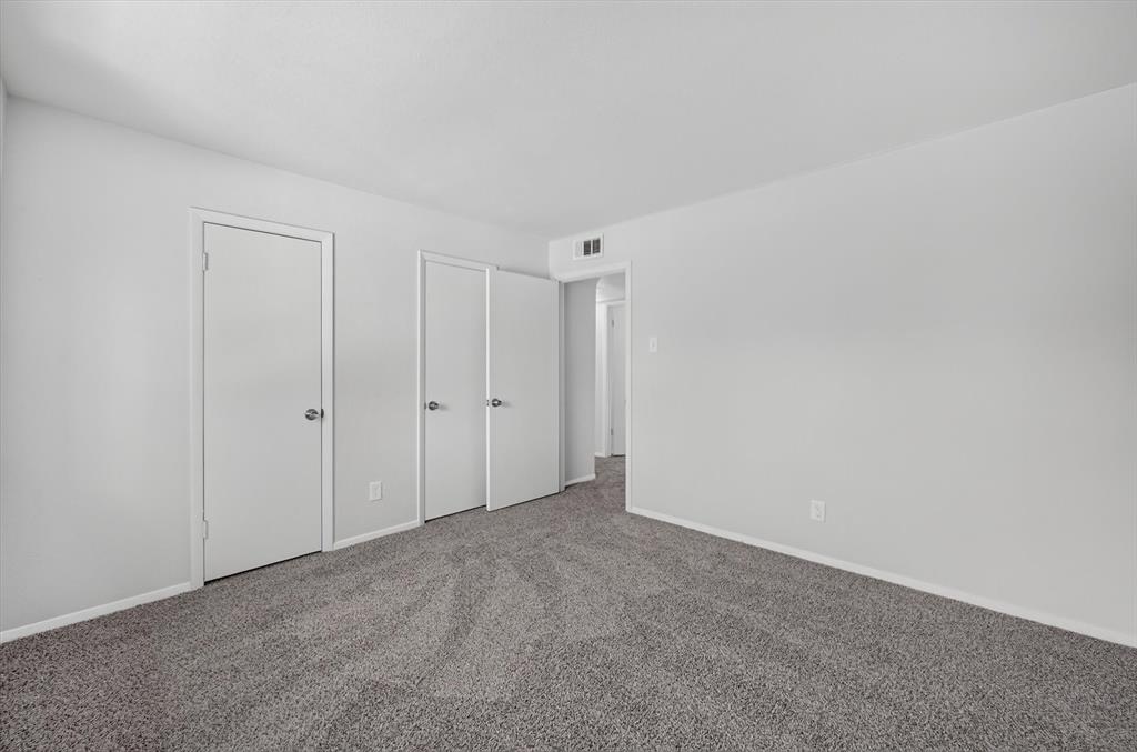 1801 East Grauwyler Road, Unit 101 Irving, TX 75061 - Photo 21 of 39 a view of an empty room