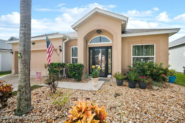 a front view of a house with a porch