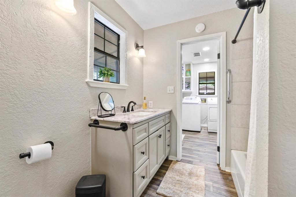2042 East 1980 Road Antlers, OK 74523 - Photo 26 of 33 a spacious bathroom with a sink and a mirror