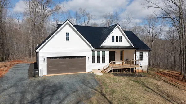 a house with trees in front of it