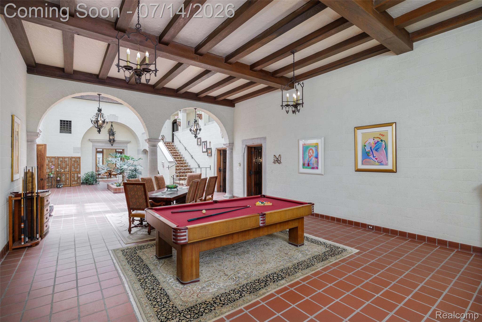 189 Cloverly Road Grosse Pointe, MI 48236 - Photo 10 of 96 Spacious interior with terracotta tile flooring and a wood-beamed ceiling