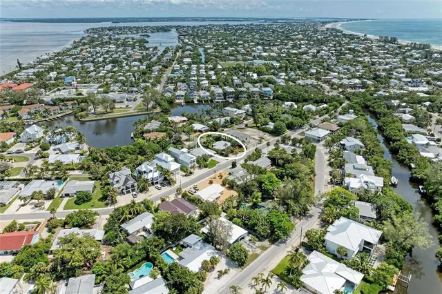 a flower plants in front of a house
