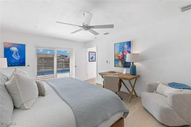 a bedroom with a bed and a cabinets