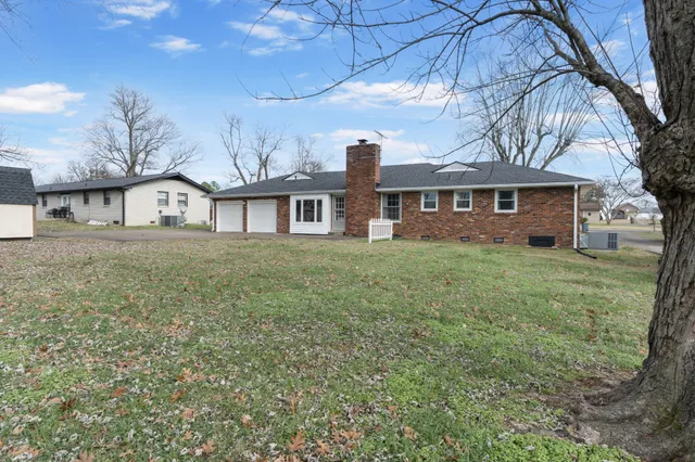 a backyard of a house with lots of green space