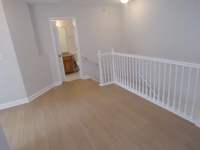a view of bathroom with a sink and a shower