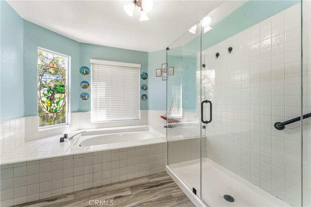 5739 Indigo Avenue Rancho Cucamonga, CA 91701 - Photo 23 of 51 Primary Bathroom Low Entry Shower and Roman Tub