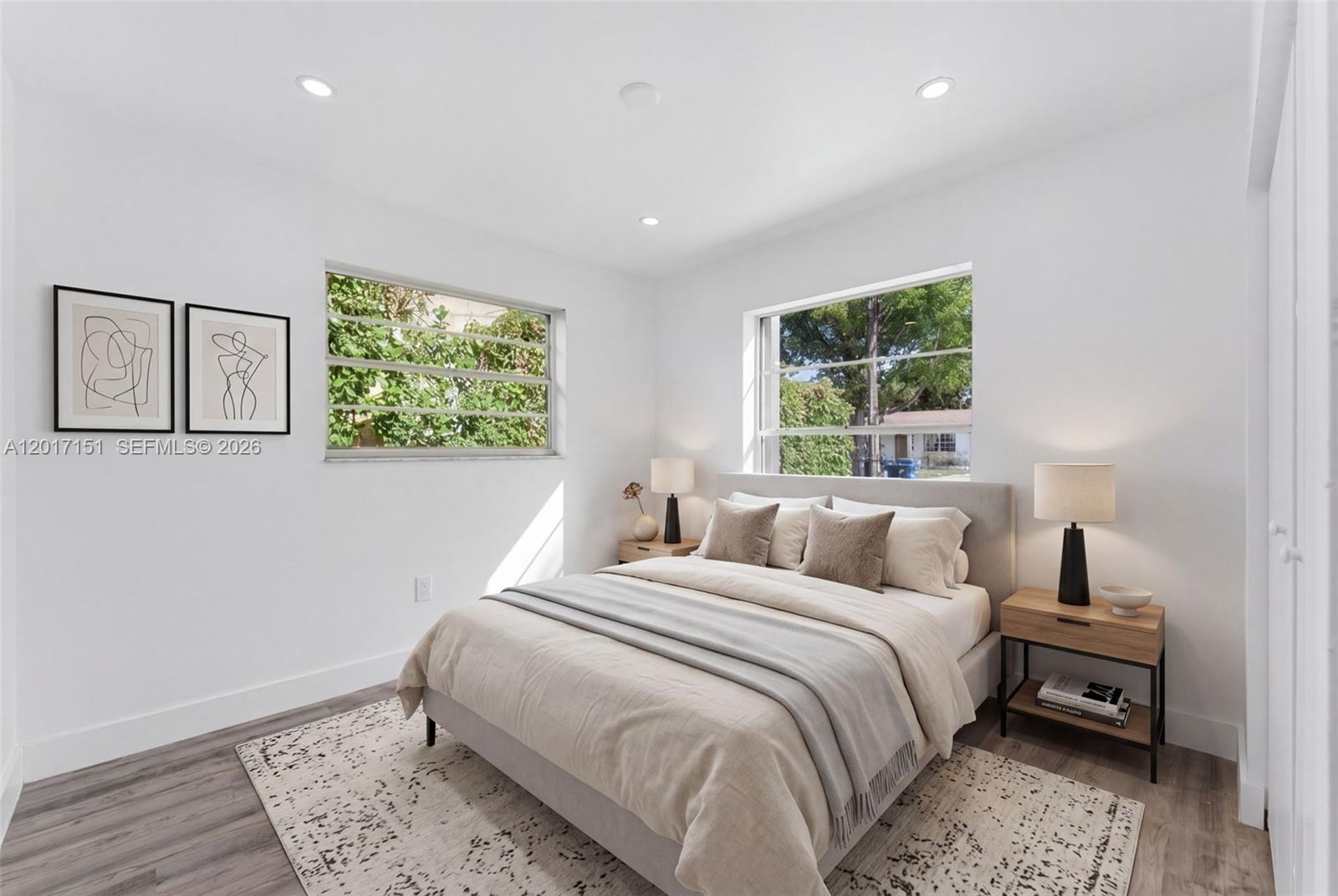 10210 Southwest 175th Street Miami, FL 33157 - Photo 15 of 25 a bedroom with a bed and a window