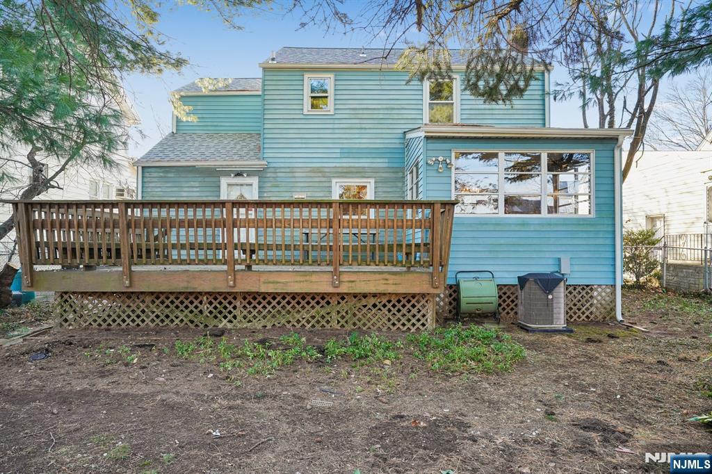 404 Burroughs Terrace Union, NJ 07083 - Photo 17 of 19 a view of a brick house with a bench