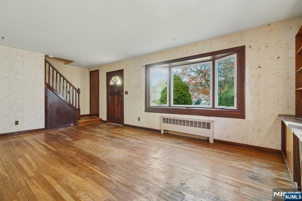 404 Burroughs Terrace Union, NJ 07083 - Photo 3 of 19 a view of an empty room with glass door and balcony