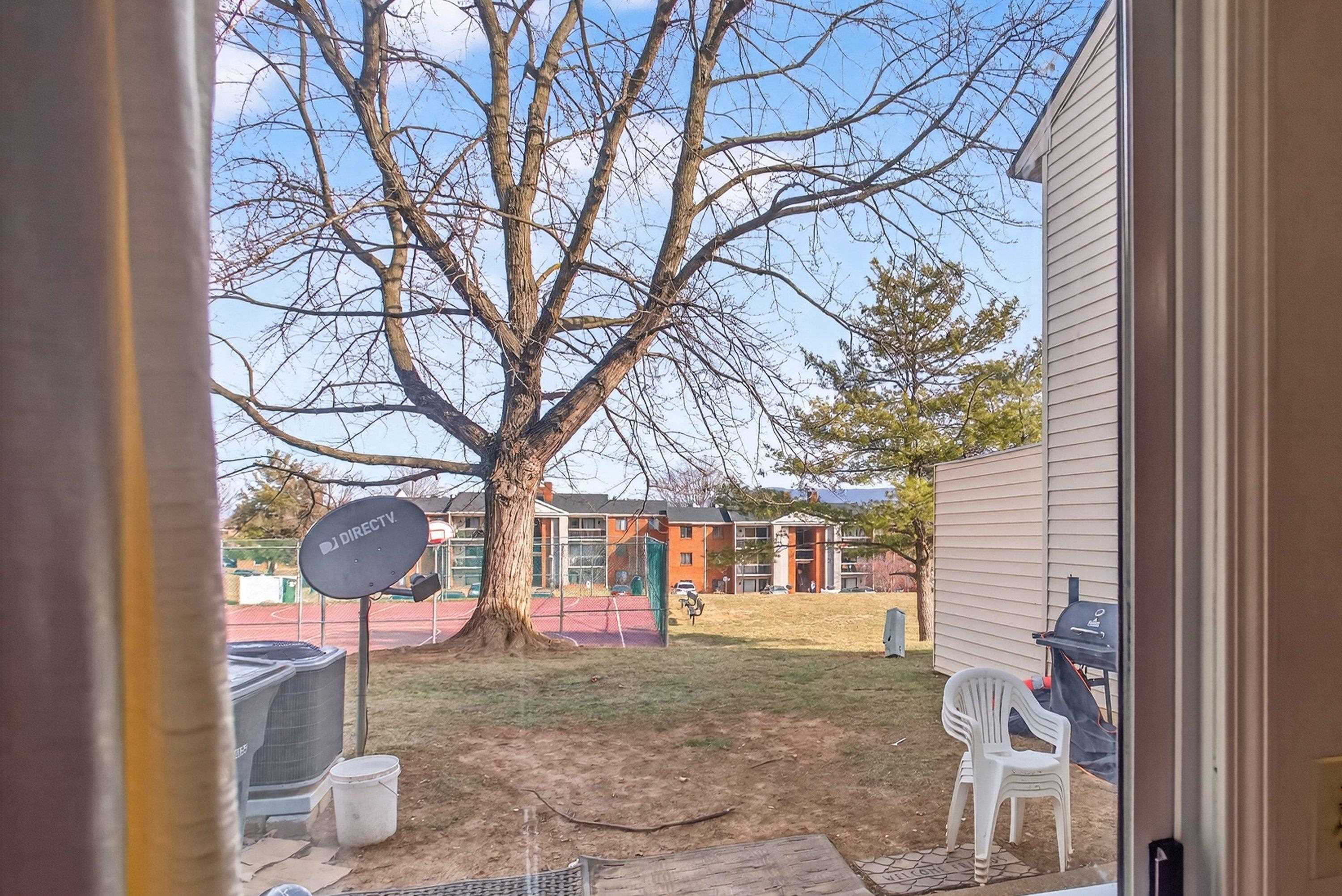 1211 Old Furnace Road Harrisonburg, VA 22802 - Photo 11 of 55 The living room offers glass patio doors leading to the rear of the home.