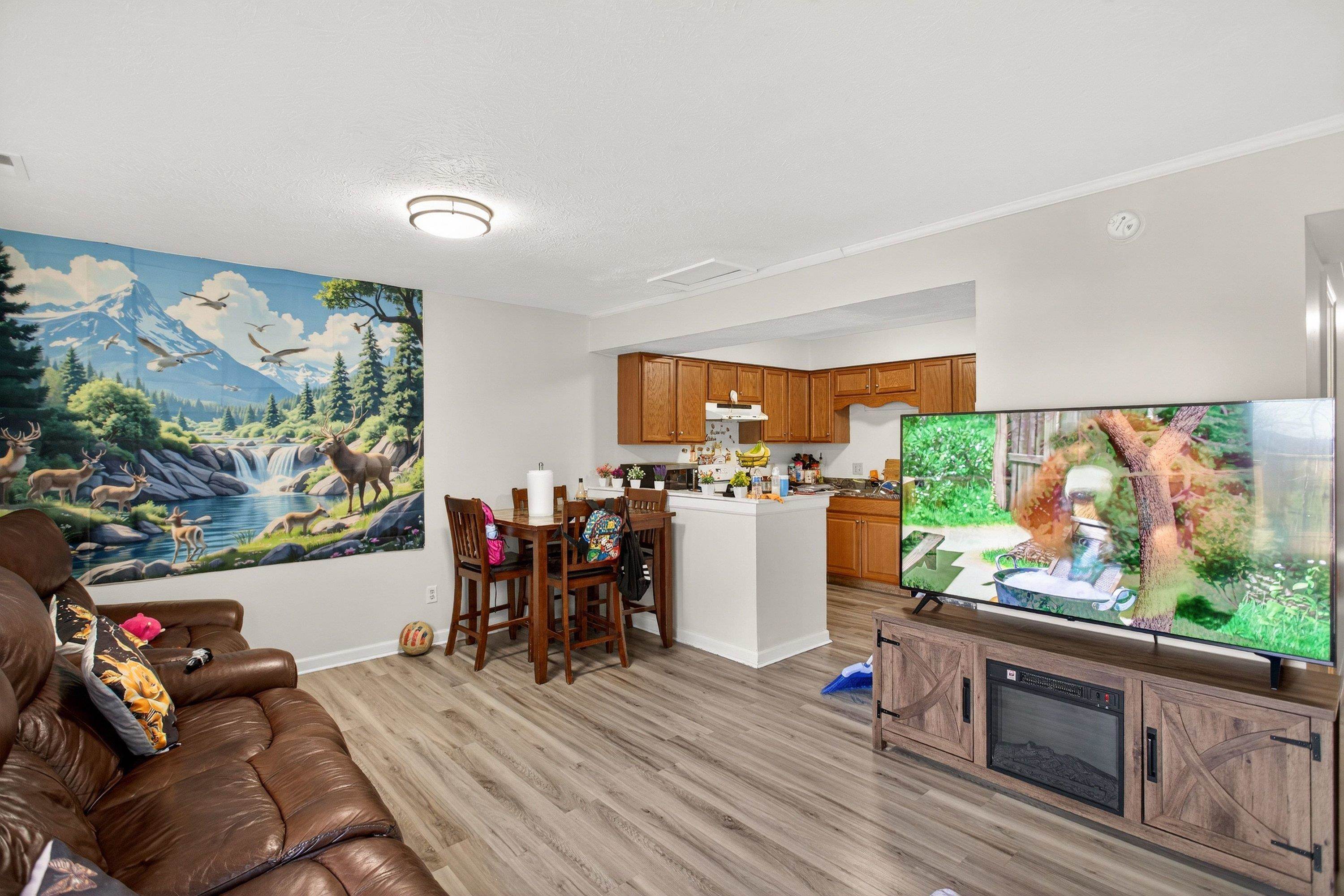 1211 Old Furnace Road Harrisonburg, VA 22802 - Photo 12 of 55 Directly off the kitchen and living room is a dining area perfect for a table and chairs set, and luxry vinyl plank flooring throughout.