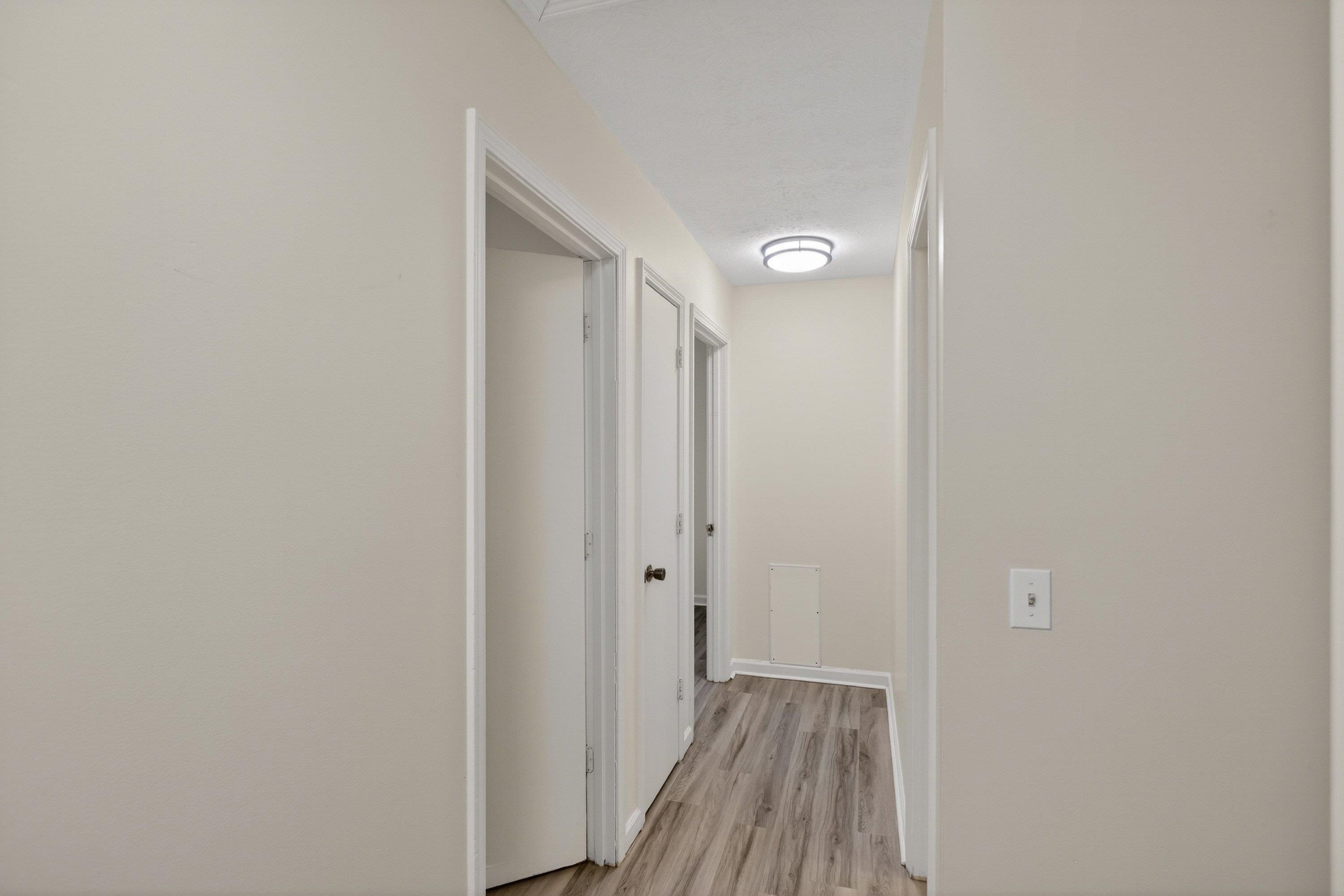 1211 Old Furnace Road Harrisonburg, VA 22802 - Photo 16 of 55 The hallway upstairs features luxury vinyl plank flooring throughout.