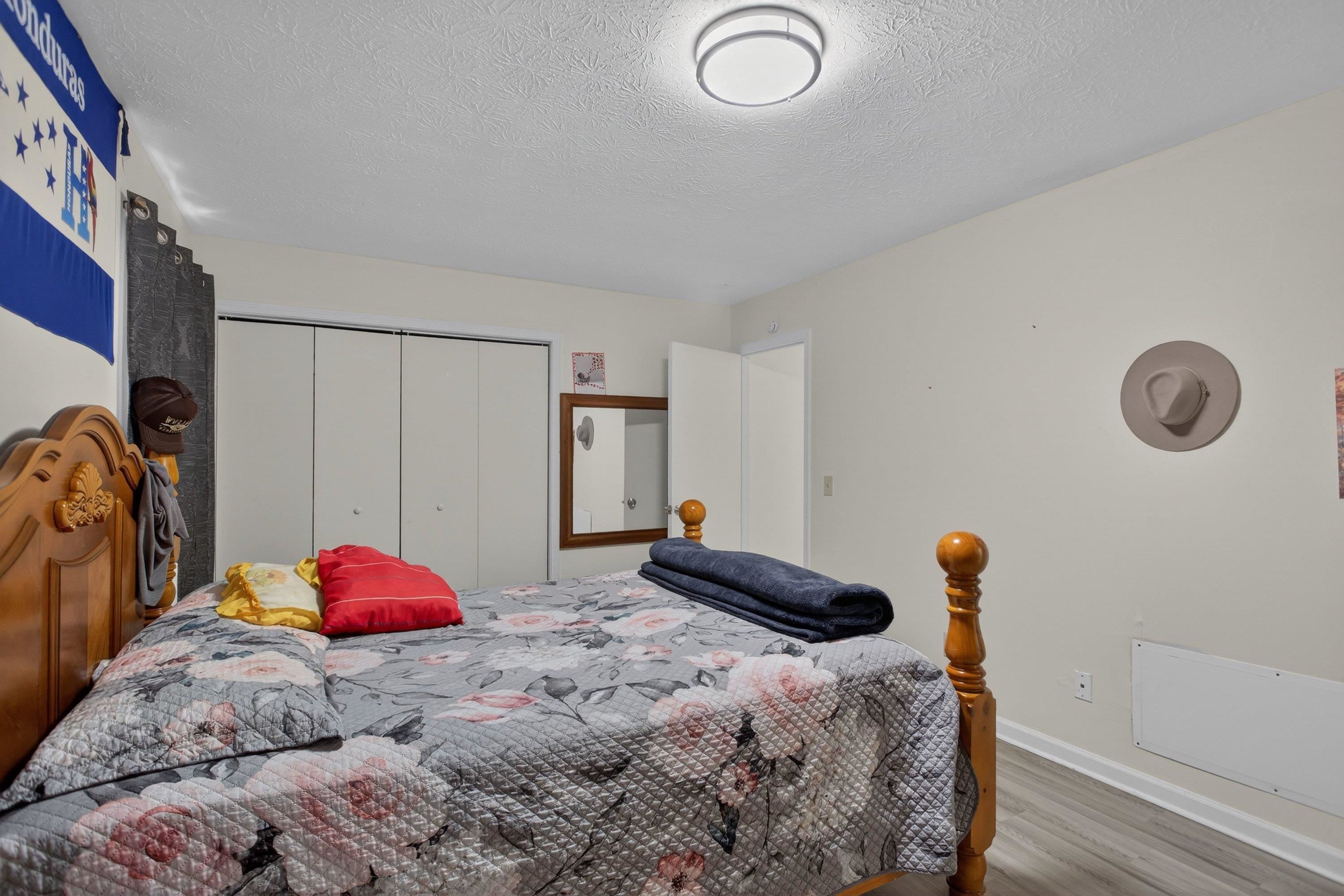 1211 Old Furnace Road Harrisonburg, VA 22802 - Photo 19 of 55 The primary bedroom offers an attached full bathroom, luxury vinyl plank flooring, large windows, spacious closet, and more!