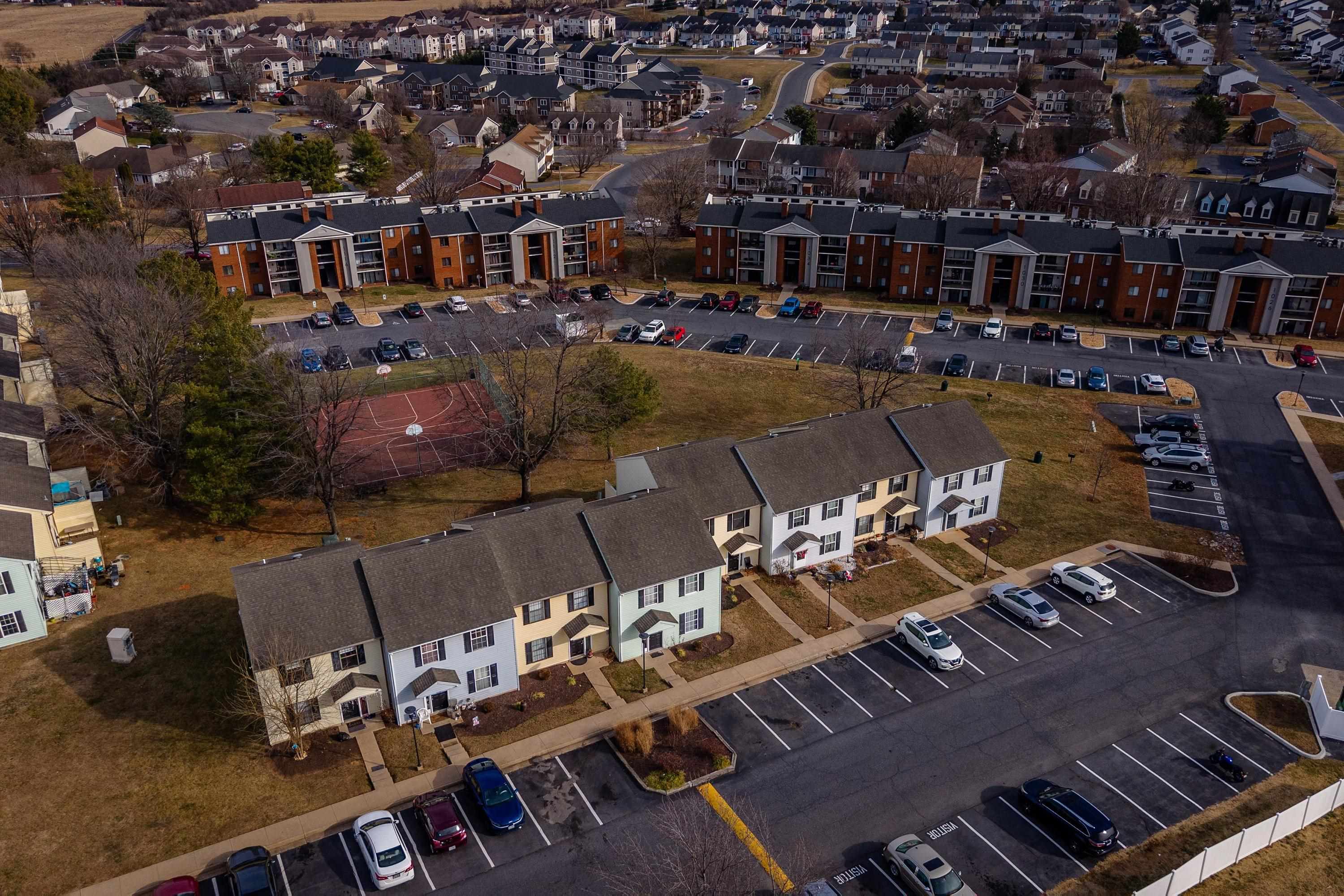 1211 Old Furnace Road Harrisonburg, VA 22802 - Photo 31 of 55 The aerial photo highlights the townhouse location within the Madison Manor neighborhood, the abundance of parking spaces, and the convenient location within the city of Harrisonburg.